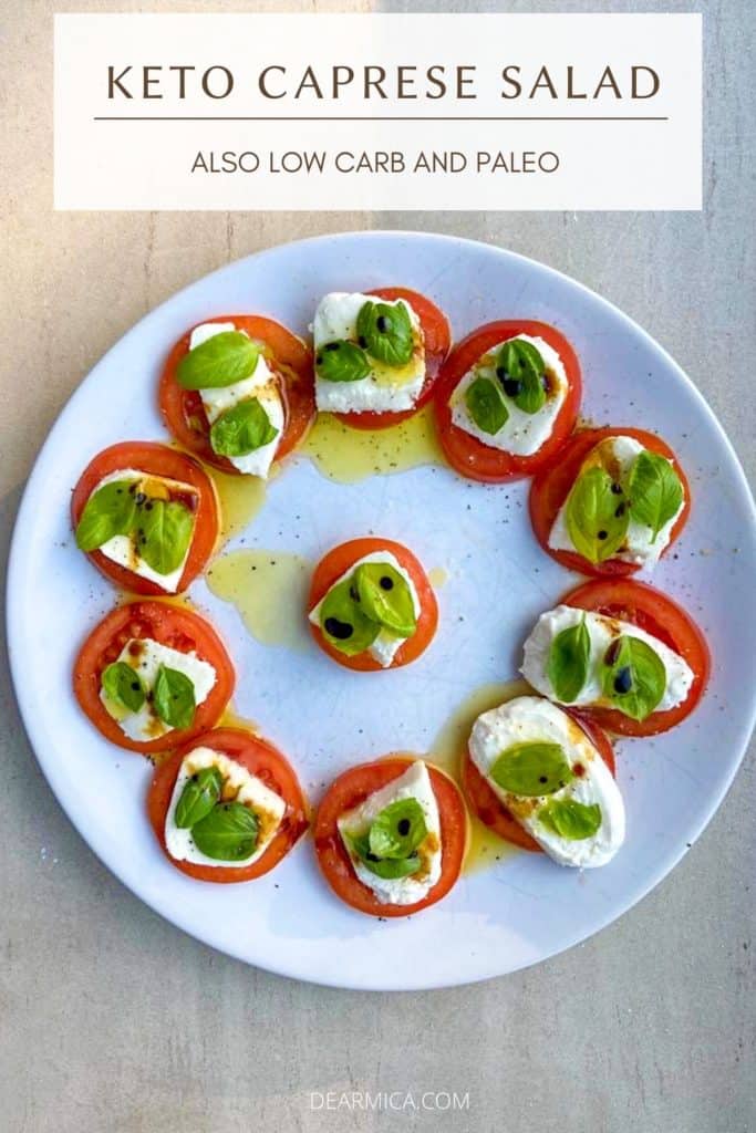 Keto Caprese salad with tomatoes, mozzarella and fresh basil.
