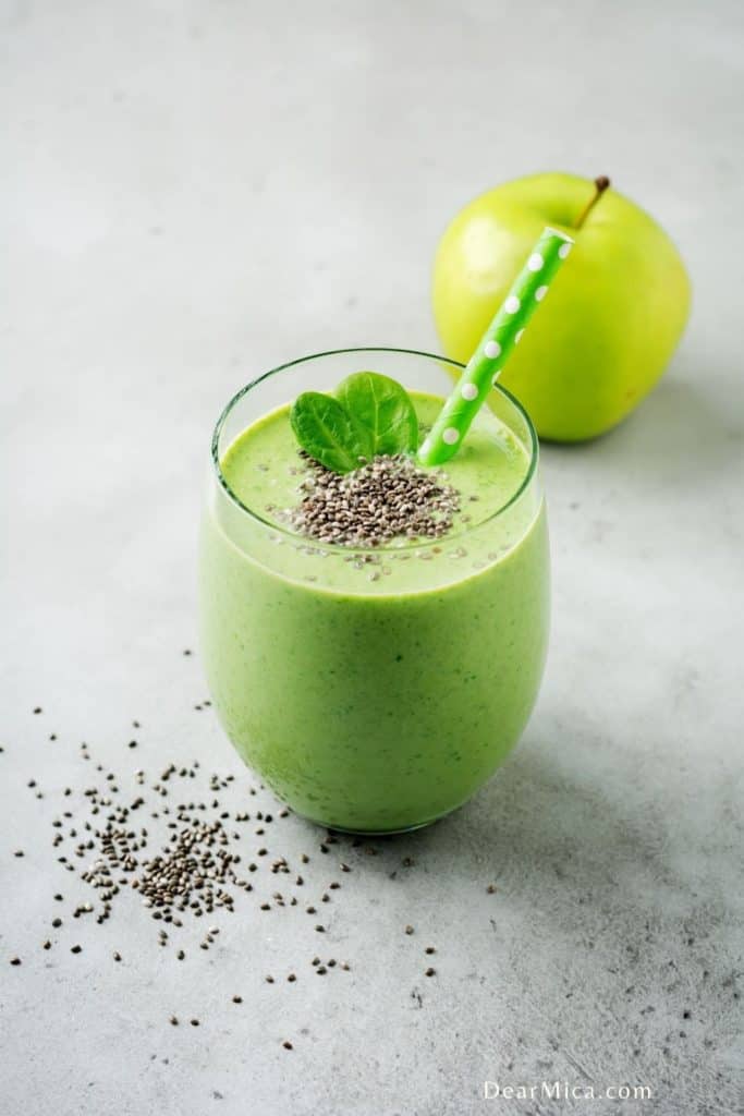a Keto Green Smoothie glass with mint and chia seeds as garnish.