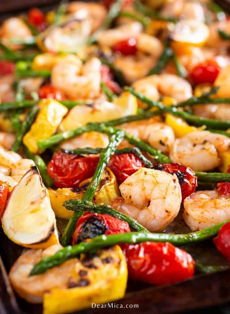 sheet pan shrimp with asparagus, lemon, tomatoes and yellow squash