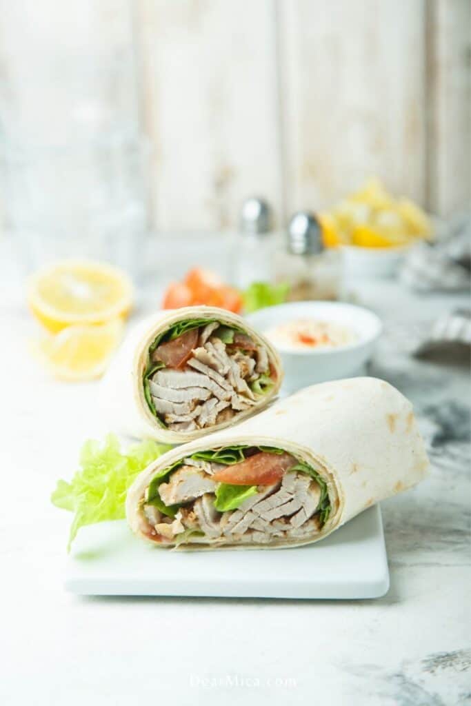 Side view of a Low Carb Leftover Turkey Wrap served on a white marble stone
